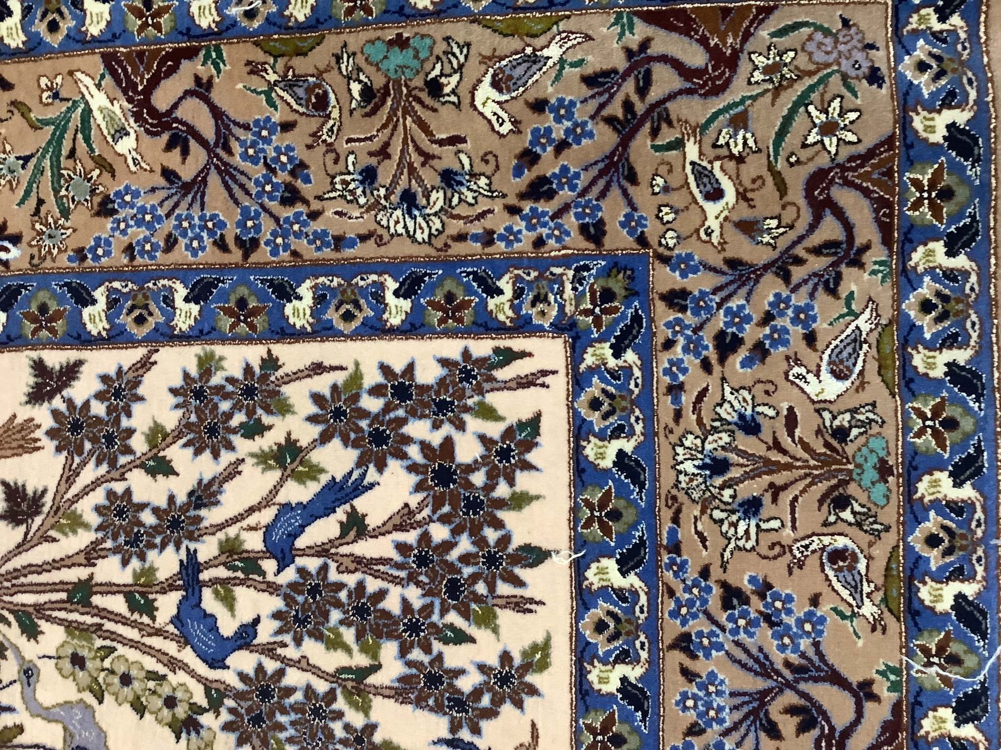 A Tabriz peach ground part silk pictorial rug, 180 x 111cm
